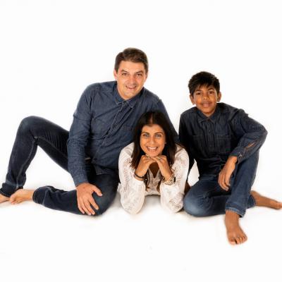 A portrait of husband, wife and son